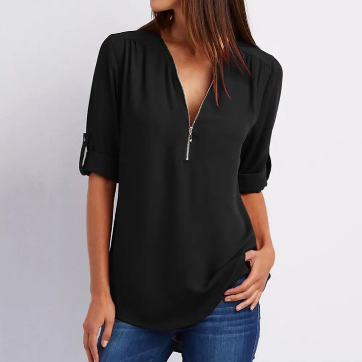 Blouse à col en V avec fermeture éclair et manches mi-longues