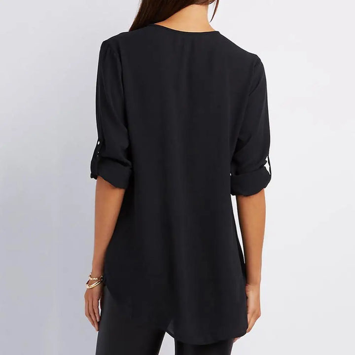Blouse à col en V avec fermeture éclair et manches mi-longues