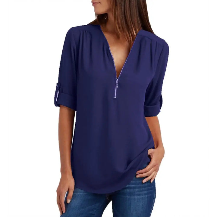 Blouse à col en V avec fermeture éclair et manches mi-longues