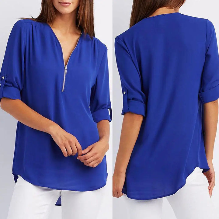 Blouse à col en V avec fermeture éclair et manches mi-longues